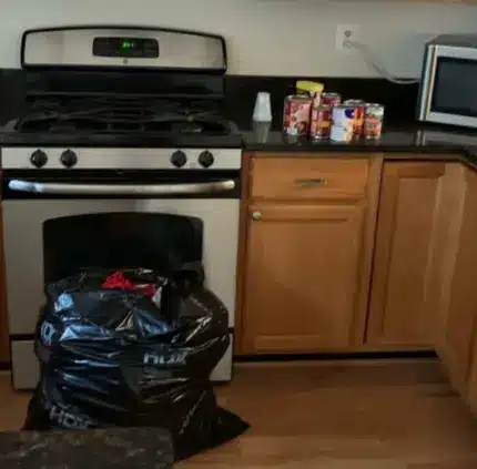 Appliance Removal in Annandale – MA Junk Removal & Cleaning Services Kitchen stove and microwave prepared for appliance removal in Annandale VA