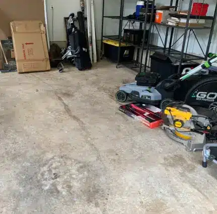 Garage Junk Removal Centreville VA garage space with power tools and empty floor after junk cleared in Centreville