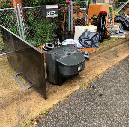 Electronics and E-Waste Removal in Springfield – MA Junk Removal & Cleaning Services Old TVs, screens, and electronics placed curbside for removal in Springfield VA
