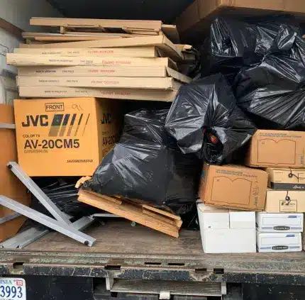 Truck filled with boxes, electronics, and trash bags for junk removal in Springfield VA