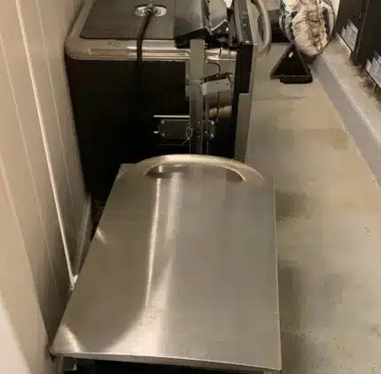 Old dishwasher and kitchen appliance prepared for removal in Virginia