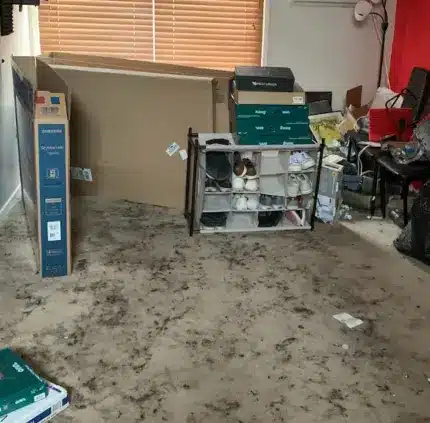 Used electronics, cords, and household clutter prepared for removal in Virginia